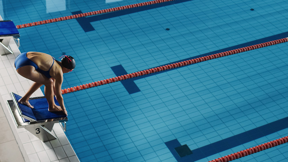 Woman swimming in pool